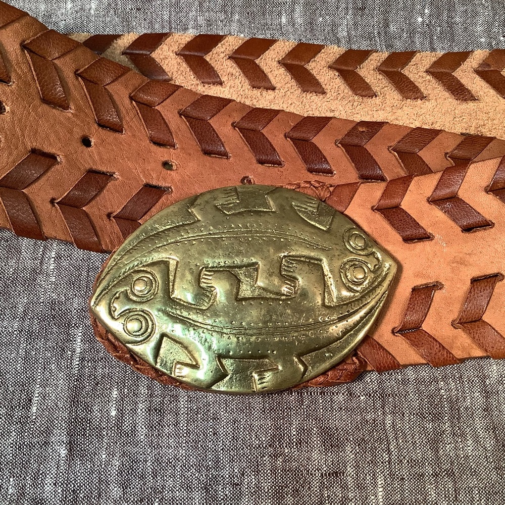 Leather hip belt with heavy brass lizard buckle